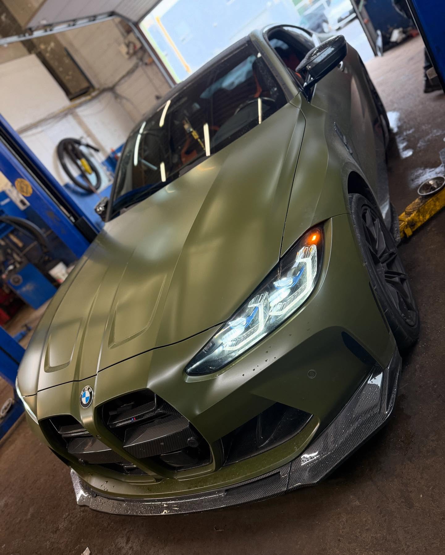 BMW in the Elite Autos 613 service bay